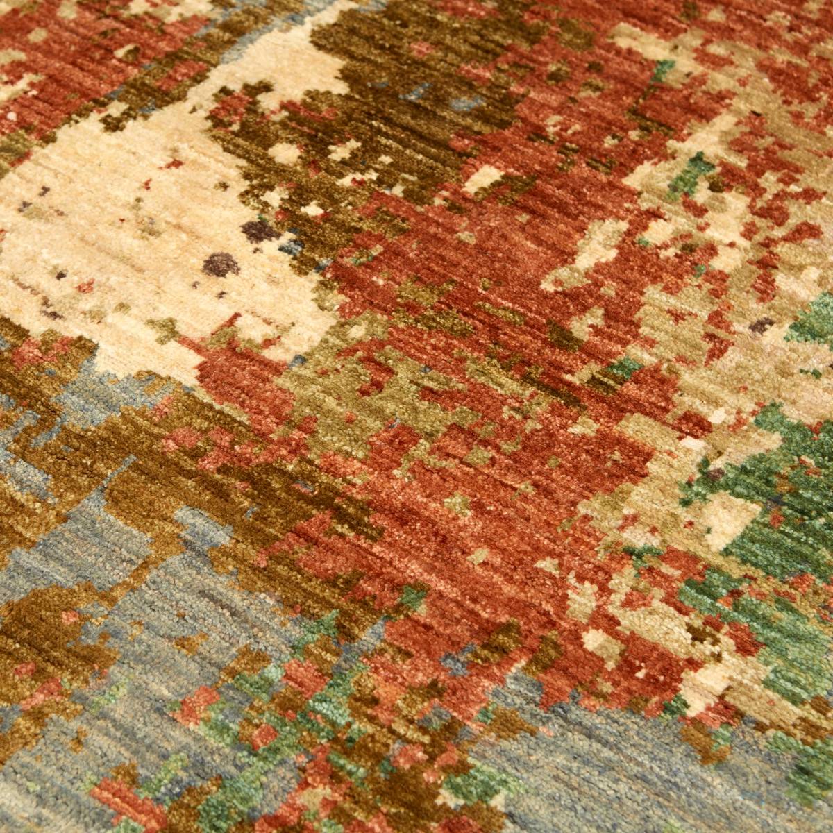 Holi matta från Nobilis i sand/terrakotta — detalj