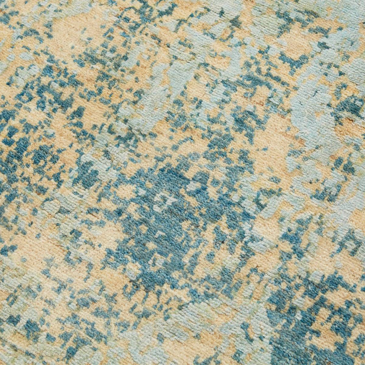 Aura matta från Nobilis i blågrön/beige — detalj